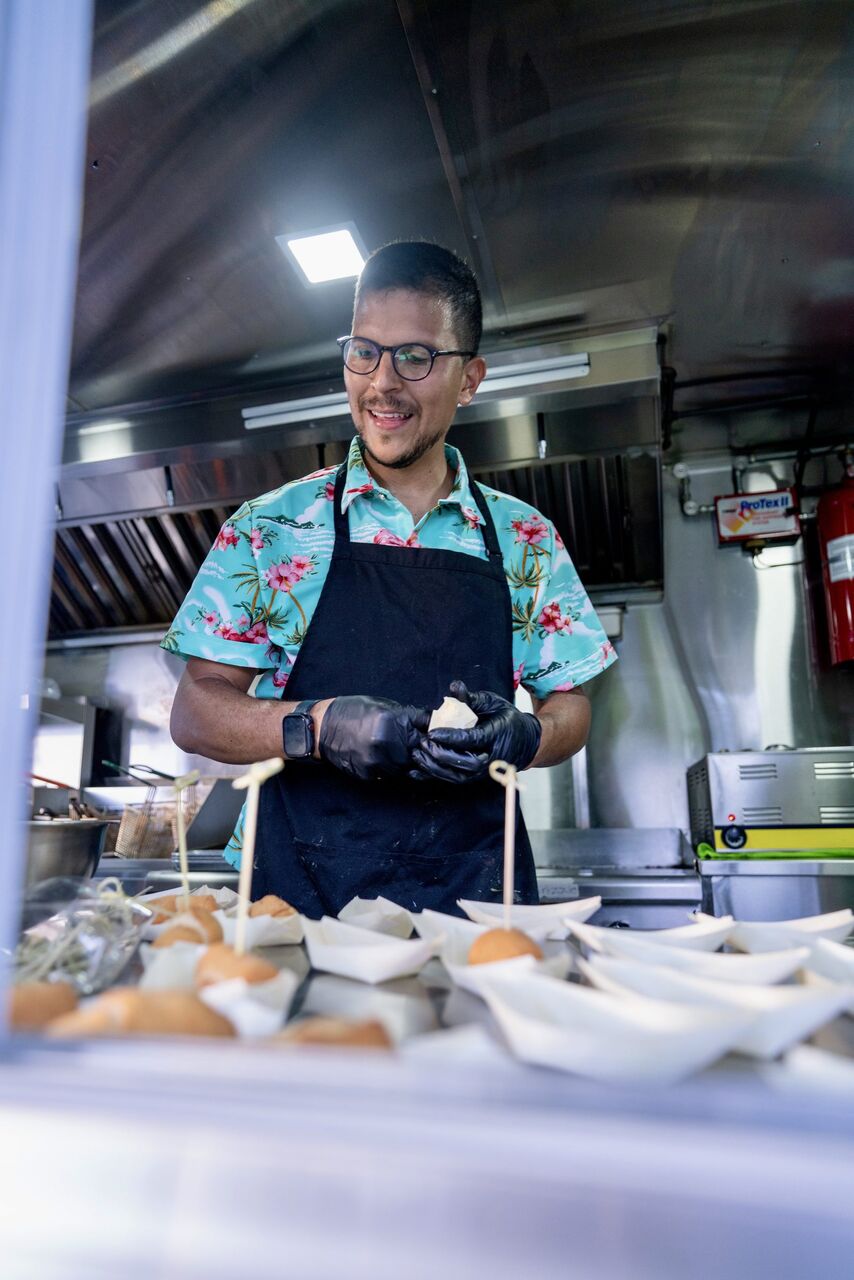 Josney, founder of Ukelele, cooking in the food truck